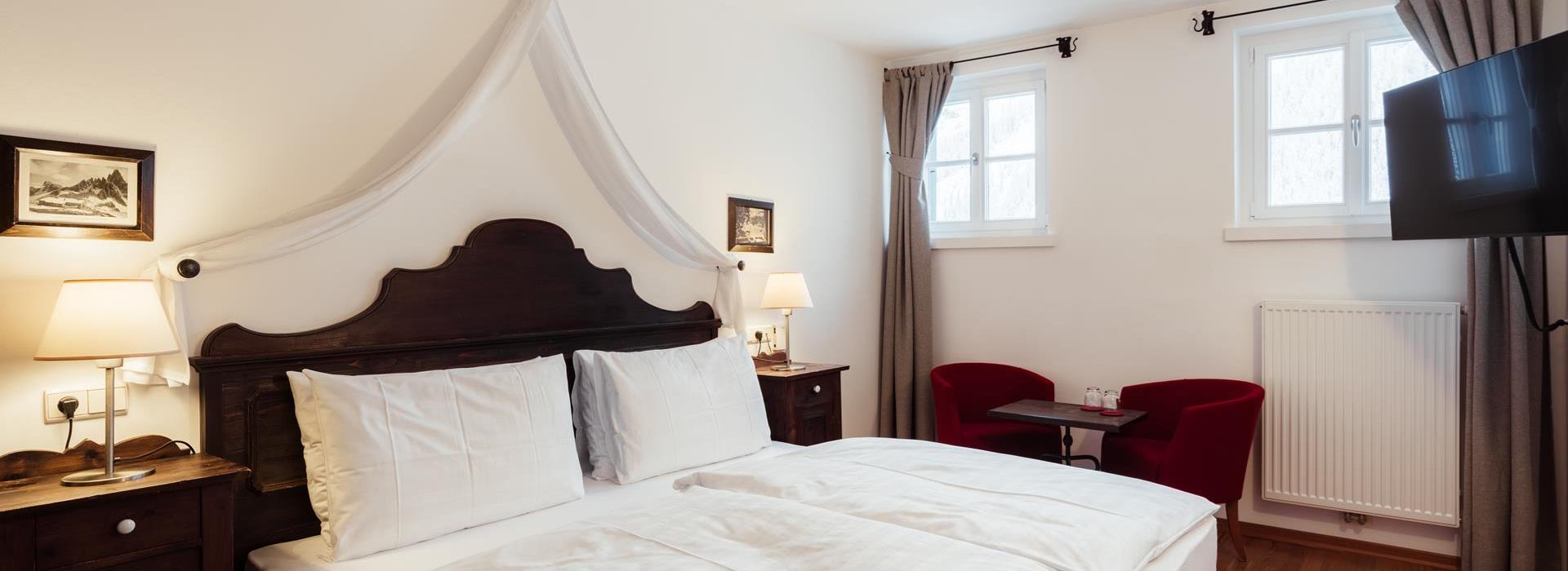 Comfort Chalet mit Doppelbett, Fernseher und Sitzecke
