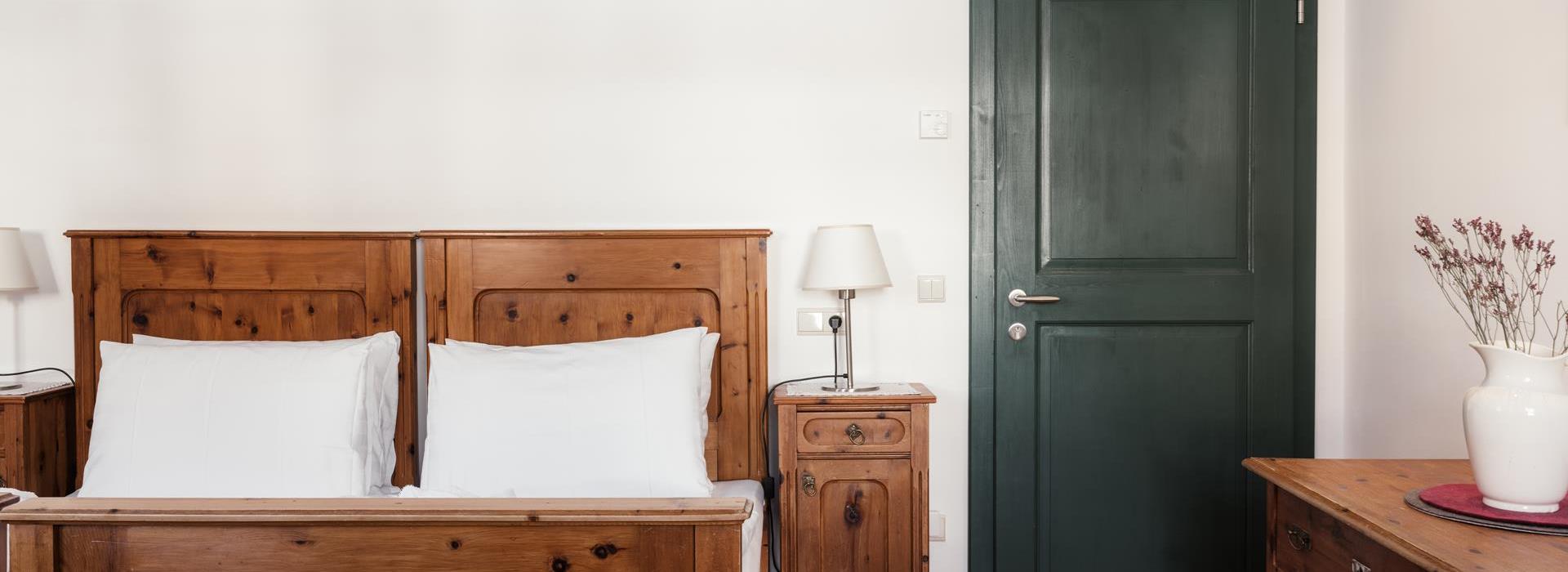 Doppelbett der Suite Chalet